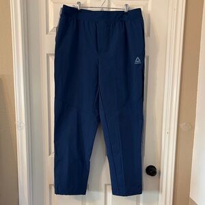 2 Reebok Men's Navy /Grey Joggers XL. 3 zipper pockets and pull string ankles.